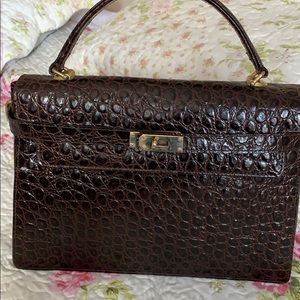 Elegant brown leather rare hand bag.